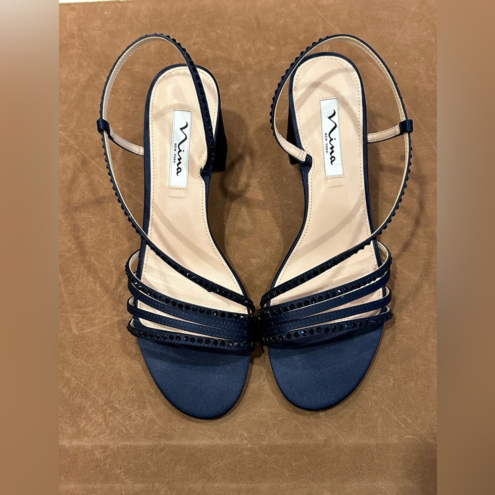 Nina New York women’s navy blue slingback evening mid-heel slip on sandal.